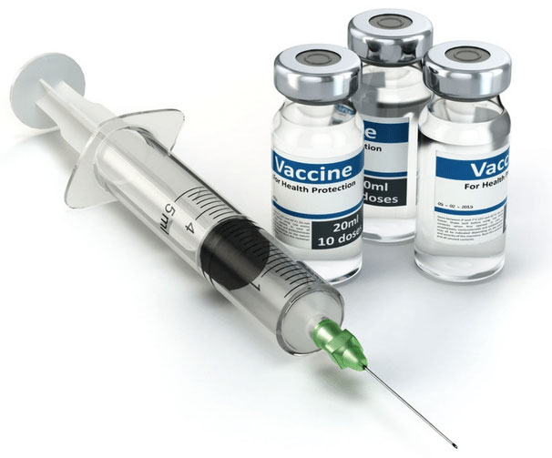 Vaccine bottles and a Syringe